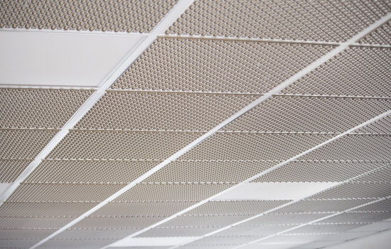 Suspended ceiling tiles designed to fit into a standard system