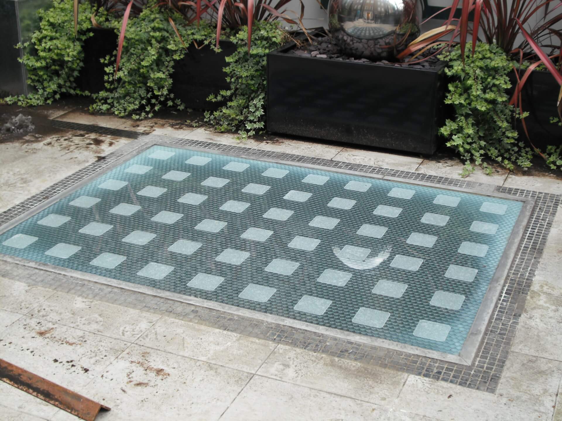 Outdoor flooring made with composite panels